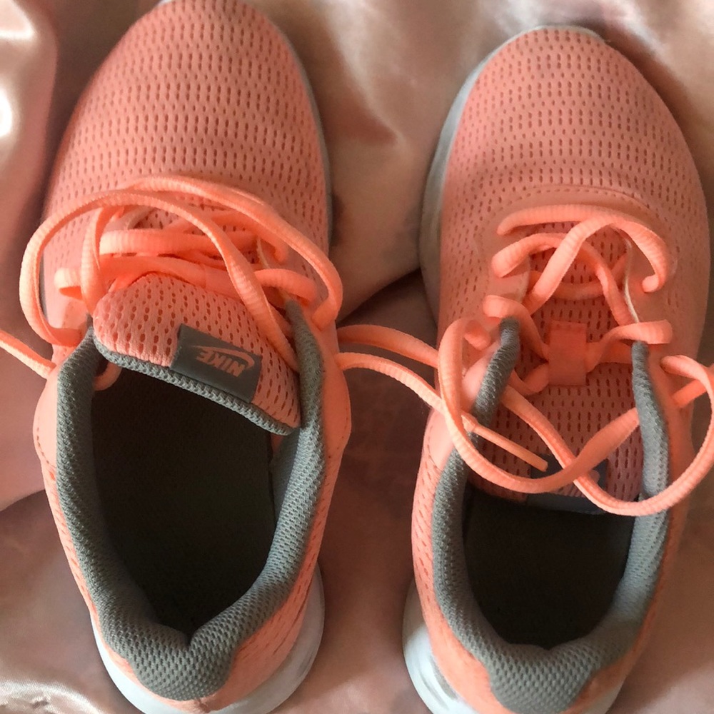 Kids Peach colored Nike sneakers